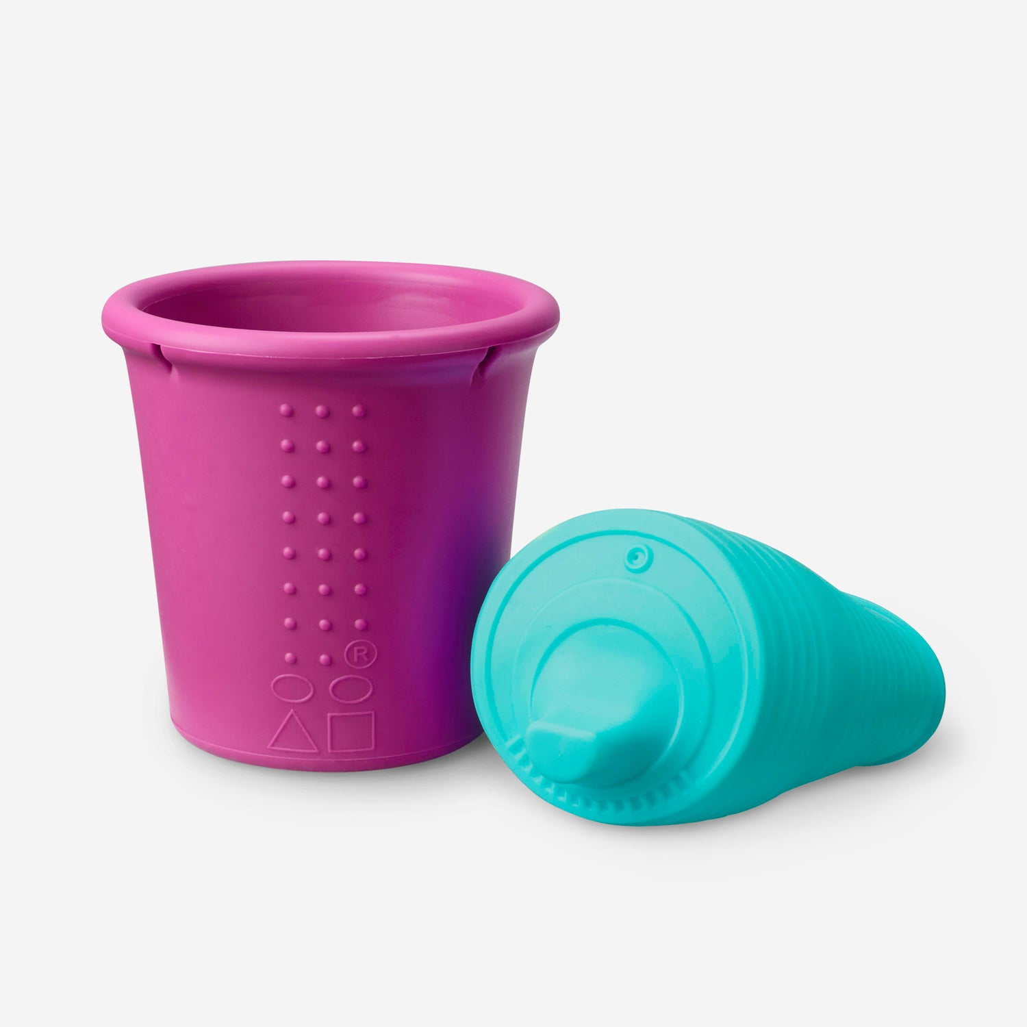 Close-up of GoSili sippy cup with stainless-steel rim for durability.
