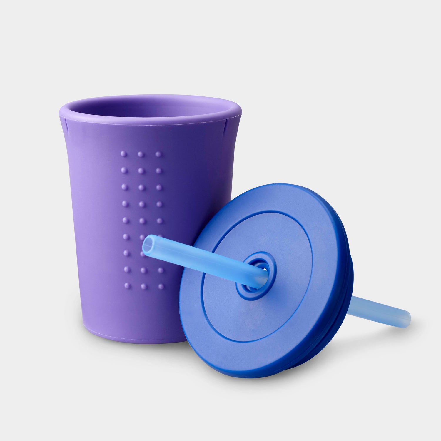 GoSili reusable silicone cup, lid, and straw placed in the dishwasher for easy cleaning.

