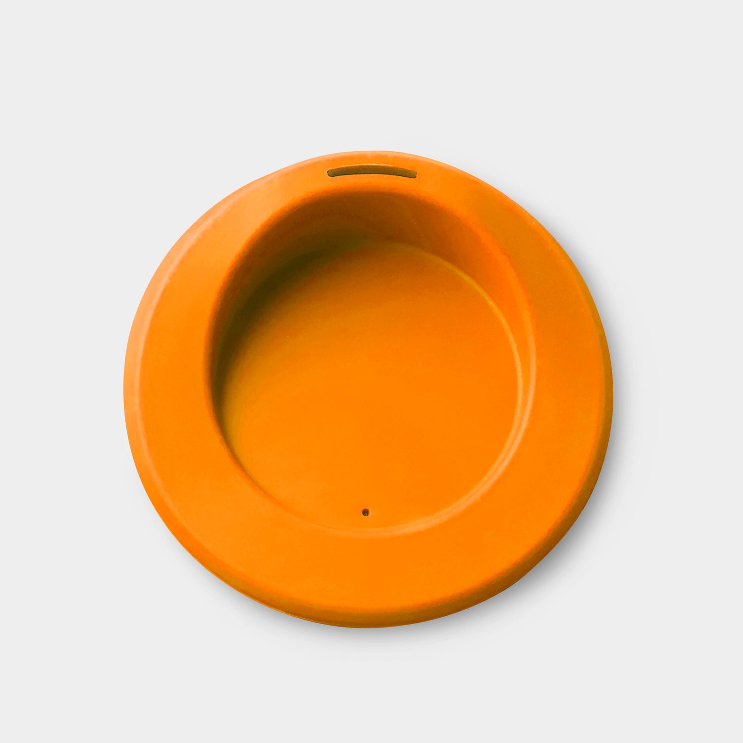 Kid-sized reusable silicone mug for warm and cold beverages.
