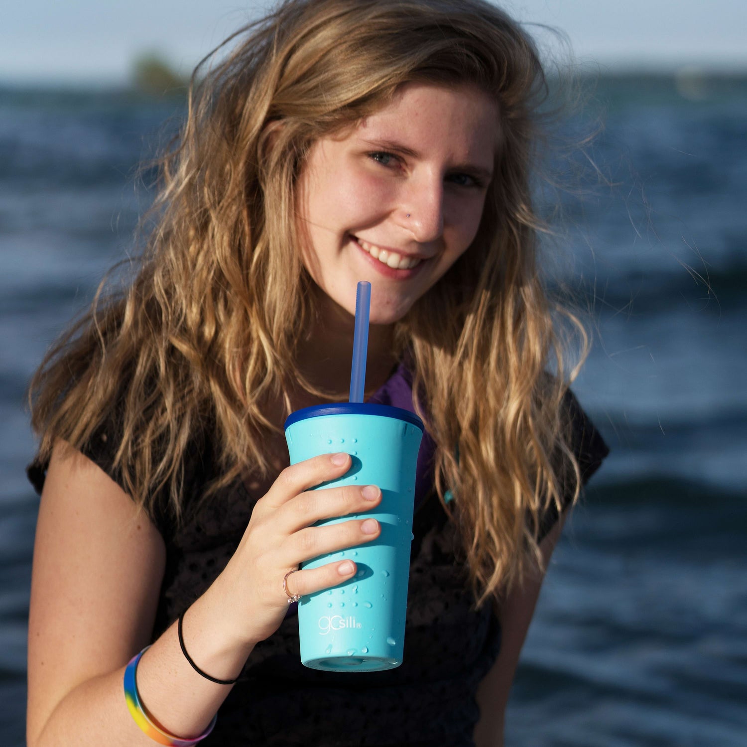 Set of silicone straw lids in assorted colors for GoSili cups, eco-friendly and reusable.
