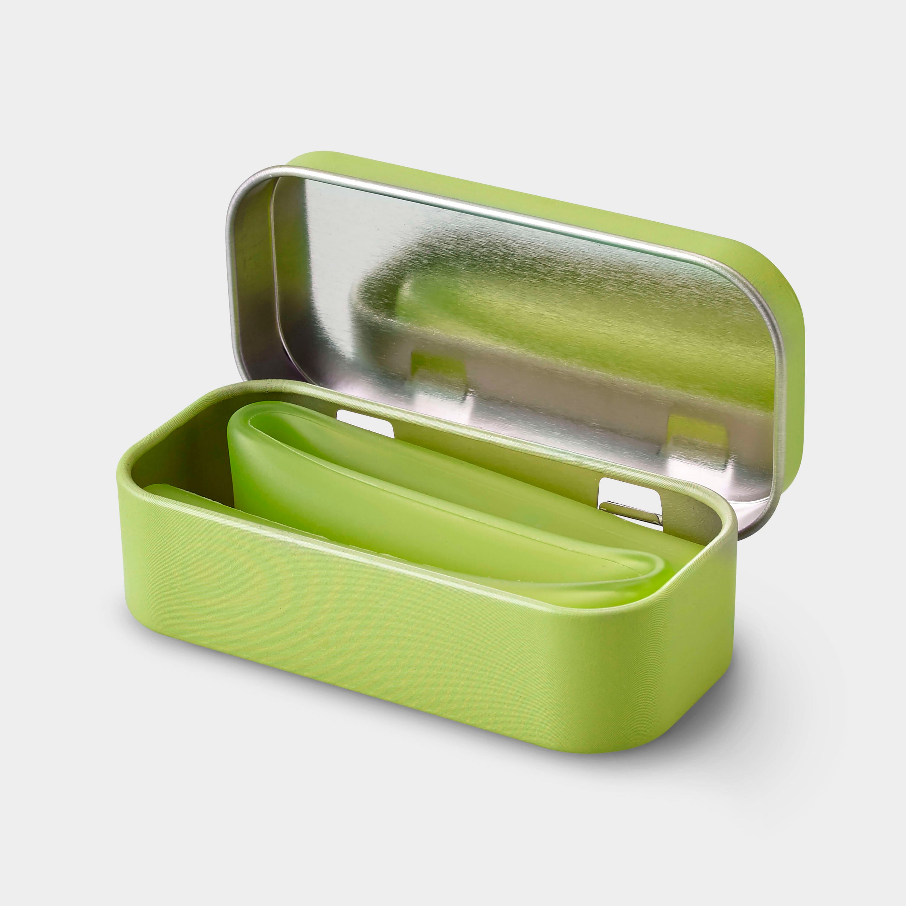 Eco-friendly reusable silicone straw folded into a sleek aluminum travel case.